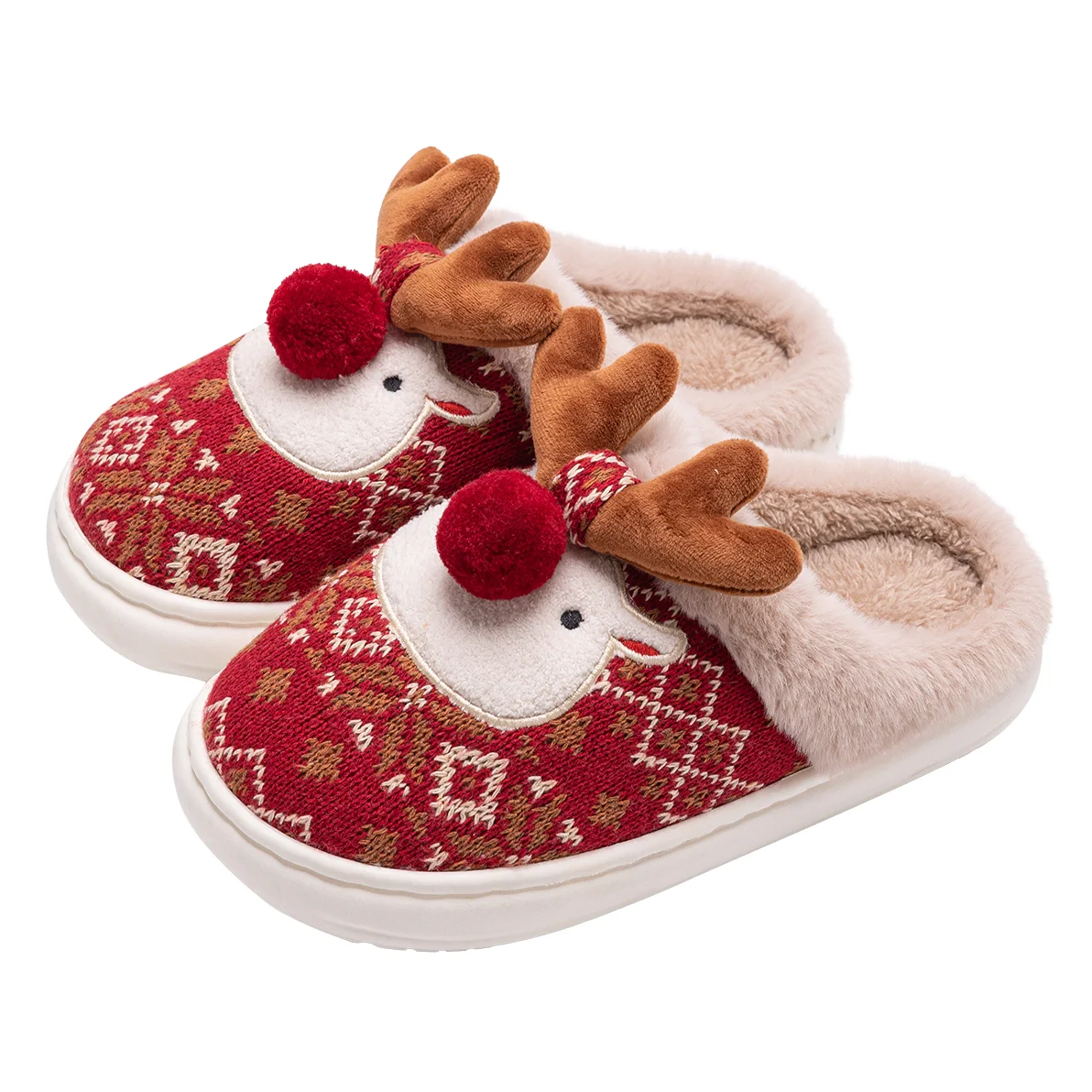 Pair of reindeer-themed slippers on a white background