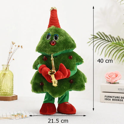 Green plush toy resembling a Christmas tree with a saxophone, standing on a white surface with measurement details.