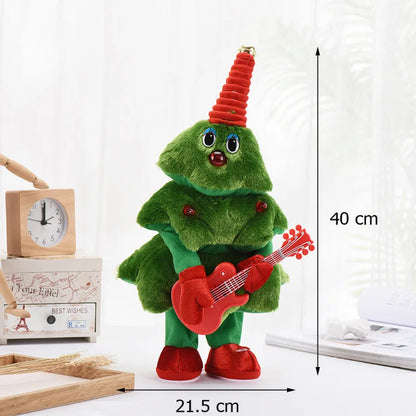 Green plush toy with red hat and shoes, playing a red guitar, on a white background with measurements indicated.