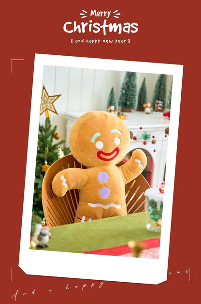 Gingerbread plush toy on a chair with Christmas decorations in the background