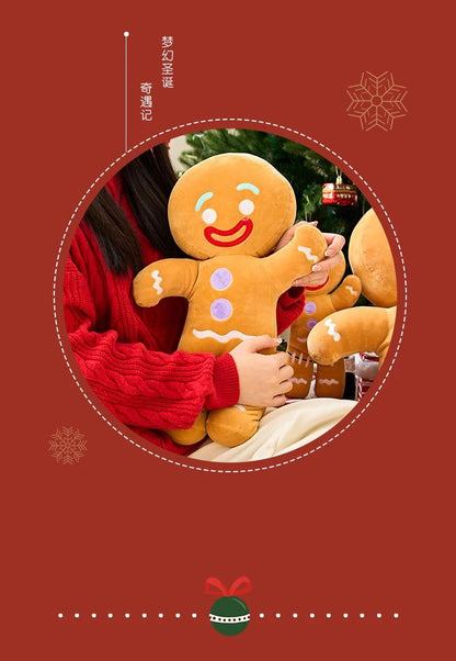 Person holding a plush gingerbread man toy against a red background with snowflake decorations.