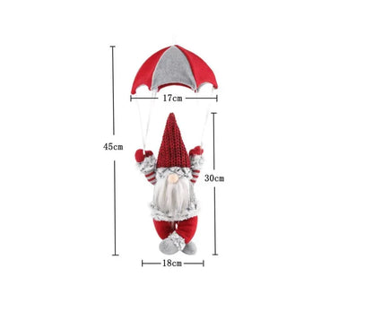 Measurement chart of a decorative gnome with red hat and white beard on a white background