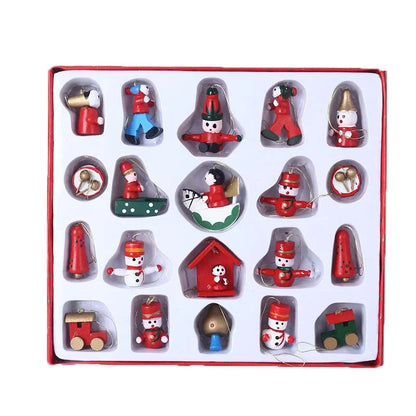 Set of Christmas-themed figurines in clear plastic cases on a white background