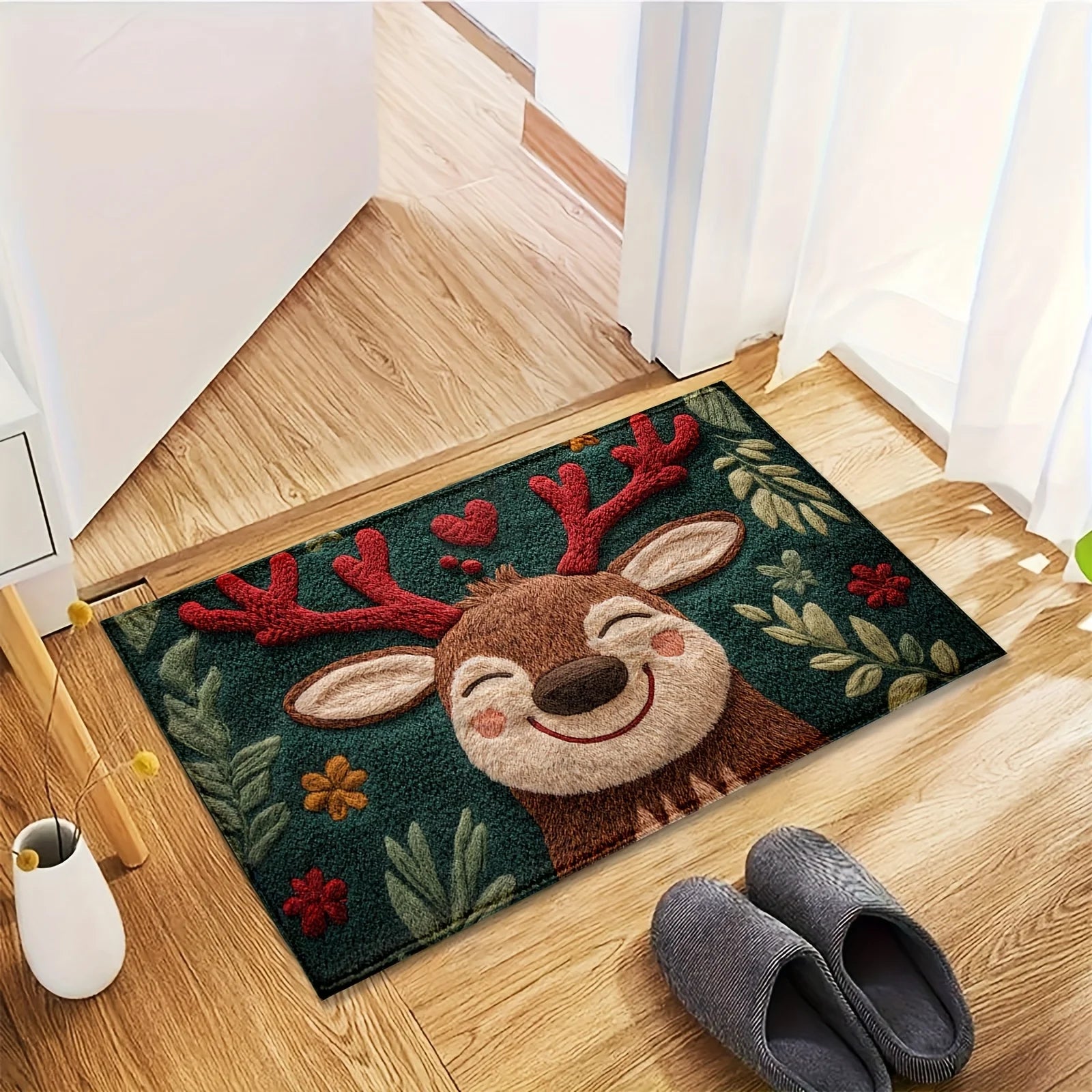 Decorative doormat with a reindeer design on a wooden floor.