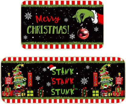 Two Christmas-themed placemats with festive designs and text.