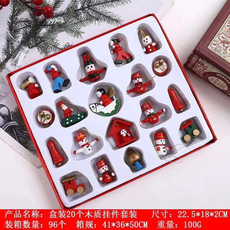 Set of Christmas-themed wooden decorations in a box with a white background