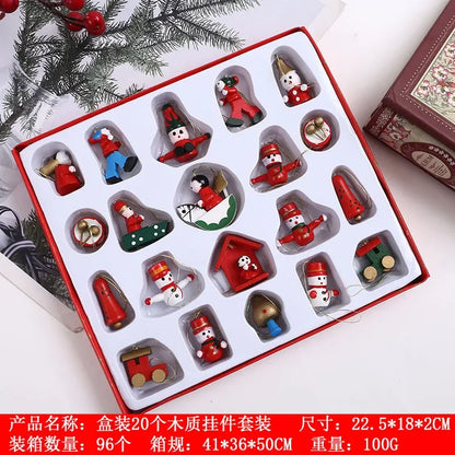 Set of Christmas-themed wooden decorations in a box with a white background