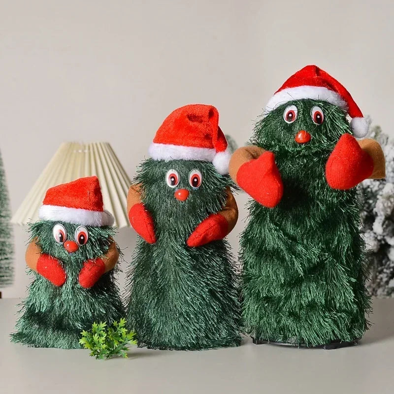 Set of three green Christmas-themed figures with red hats and scarves on a neutral background.