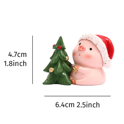 Small pig figurine with a Santa hat holding a Christmas tree, with measurements indicated.
