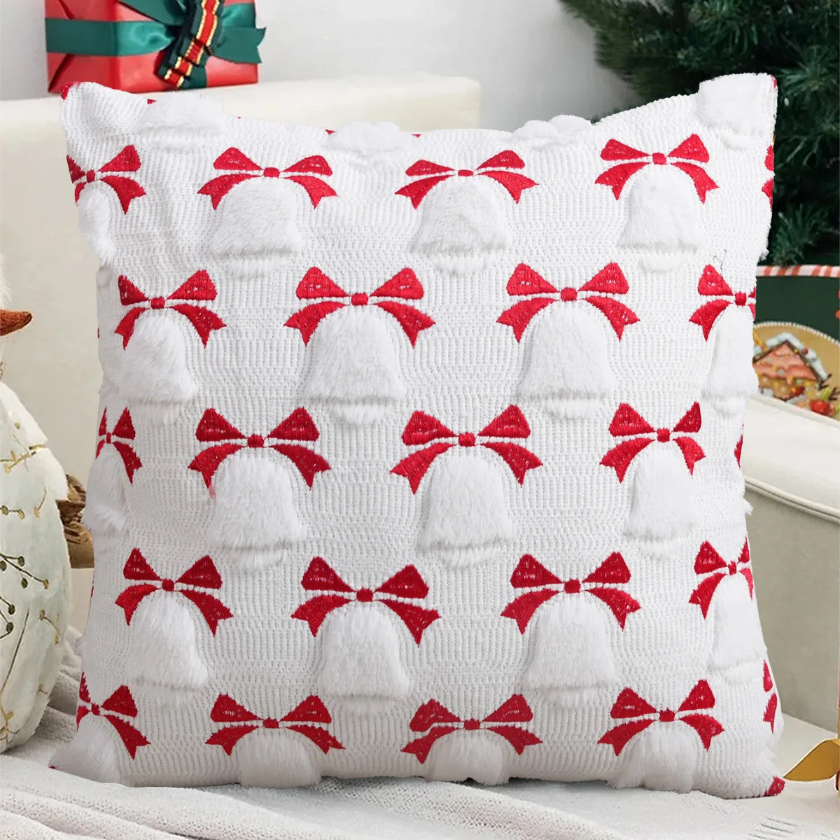 Decorative pillow with red bow pattern on a festive background