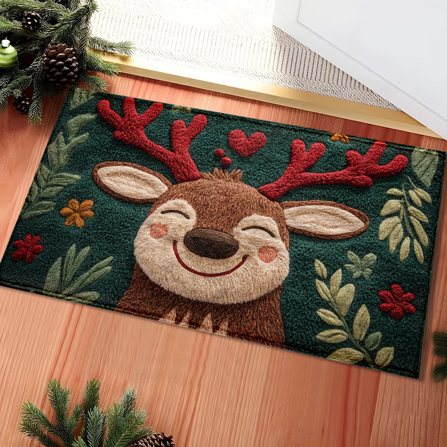 Decorative doormat with a reindeer design on a wooden floor.