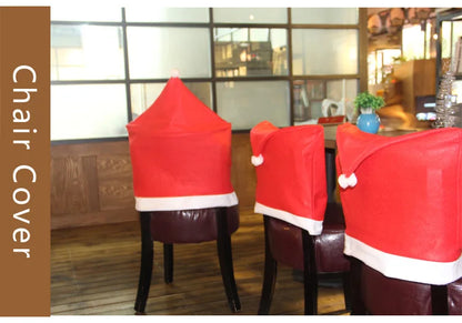 Red Santa hat chair covers on brown chairs in a room with large windows.
