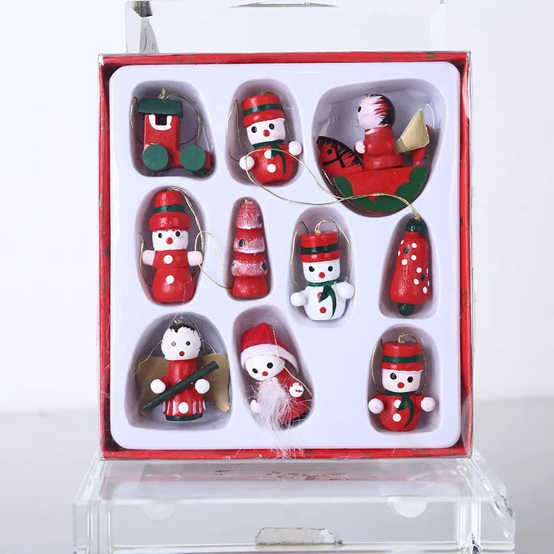 Set of Christmas-themed nail art decorations in a clear box on a white background