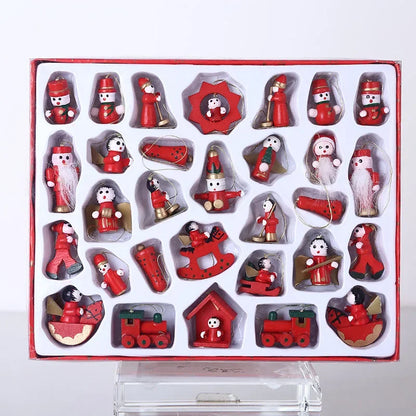 Set of red and white Christmas-themed ornaments in a box on a white background